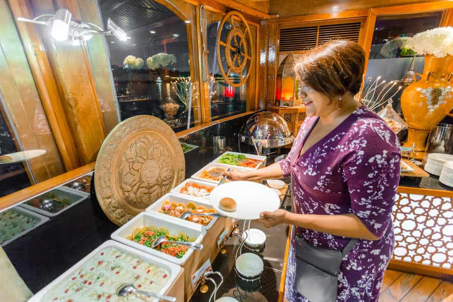 Dubai: 2-Hour Evening Dhow Cruise and Dinner - Views While You Eat: Souks, Banks, Palaces, And Reflections