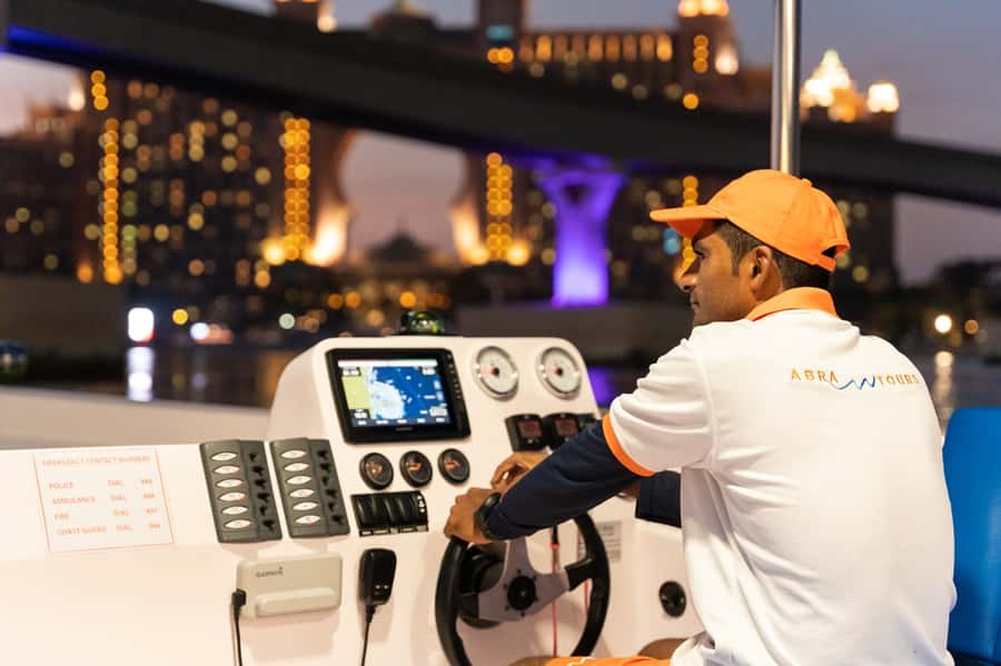 Dubai: Abra Boat Tour in Atlantis, Palm, Ain Dubai & Marina - Onboard comfort: washroom, shower, Bluetooth music, and seating