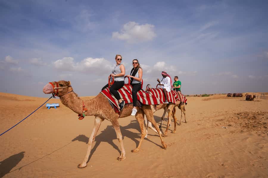 Dubai: Adventure Quad Bike Safari, Camel Ride & Refreshment - Quad Bikes, Sandboard, Camel, Repeat: What Your Desert Day Feels Like