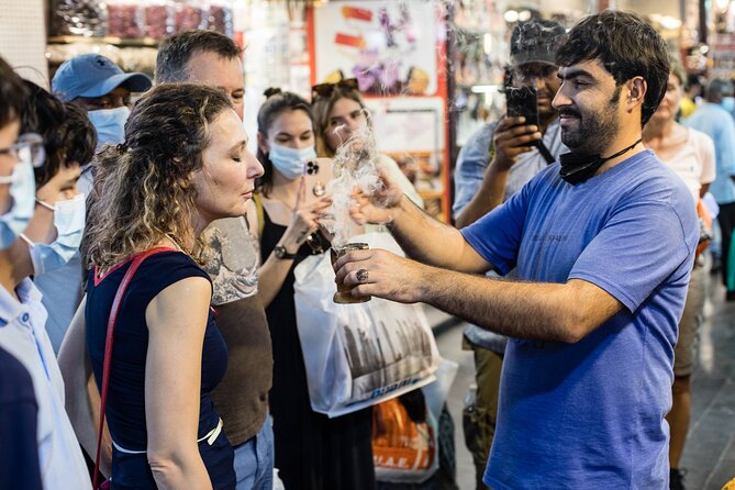 Dubai Aladdin Tour: Souks, Creek, Old Dubai and Tastings - Old Souk haggling: textiles, shawls, and the art of not overpaying