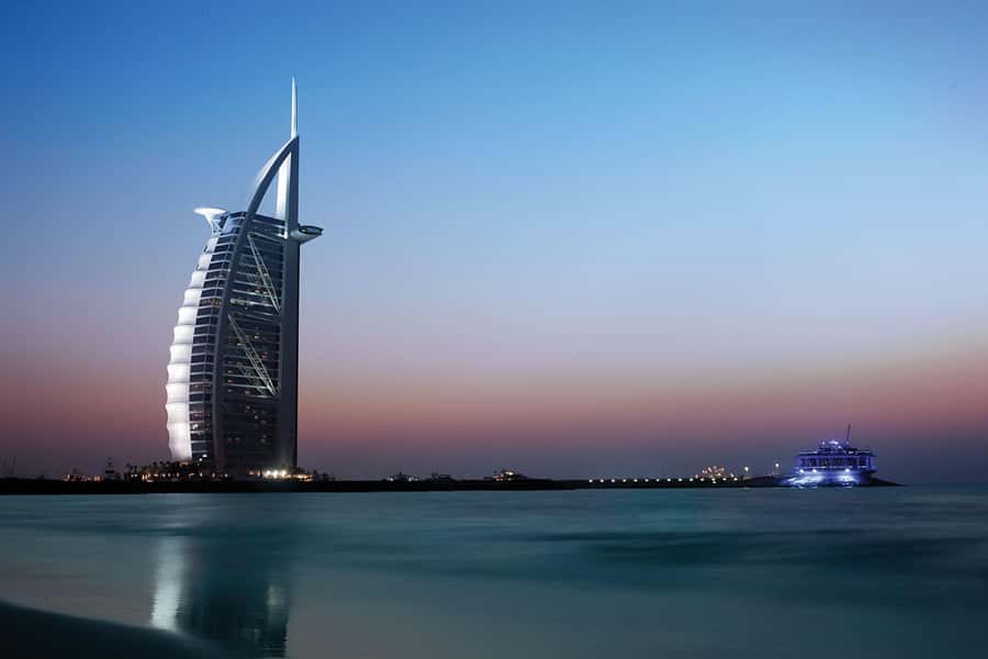 Dubai: Big Bus Panoramic Night Tour & Optional Dinner Cruise - Burj Khalifa after dark: The stop that can test audio and timing