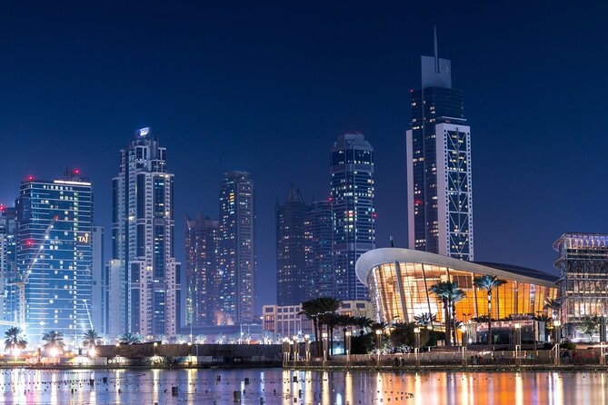 Dubai by Night City Tour - Jumeirah Beach photo stop: quick coast views, limited time