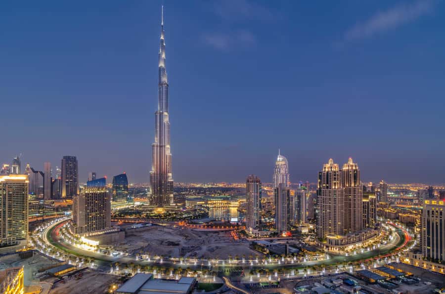 Dubai by Night City Tour with Fountain Show - The Sheikh Zayed Road drive: instant city-wide perspective
