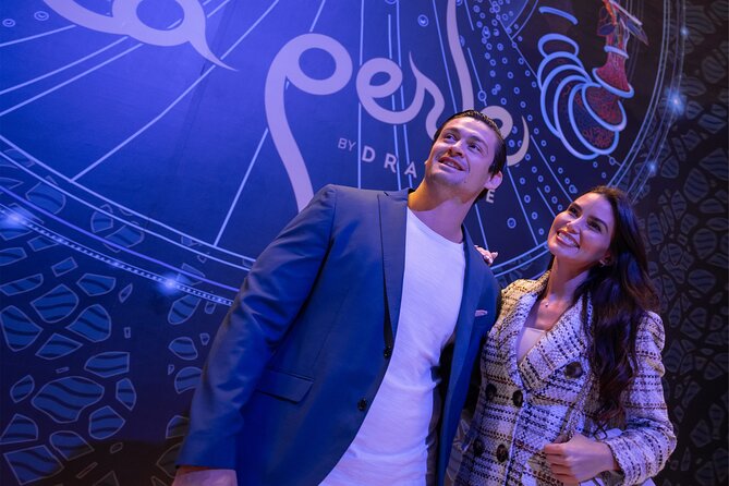 Dubai Canal Dinner Cruise with La Perle Show Tickets Combo - Dubai Water Canal at night: bridges, the waterfall, and the city’s wiring