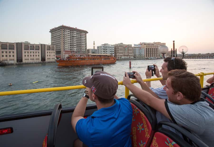 Dubai: City Sightseeing HOHO Bus Tour + Sunset & Night Tour - Practical tips: finding stops, packing right, and riding smart