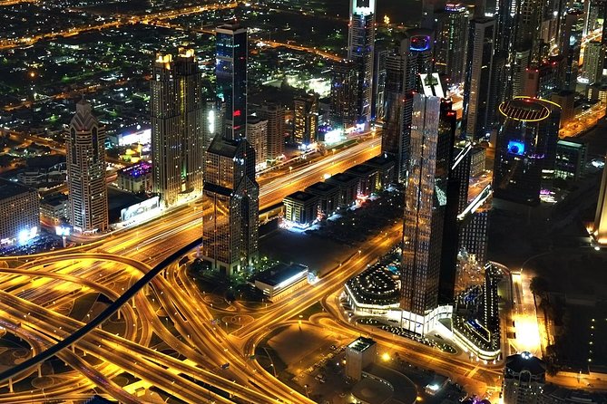 Dubai City Tour By Night With Burj Khalifa Ticket - Souk Madinat Jumeirah: where the tour slows down just enough