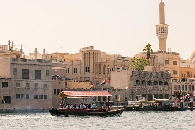 Dubai City Tour with Desert Safari, Camel Ride, Dune Bashing & BBQ - Abra over Dubai Creek and the Deira souks without the planning headache