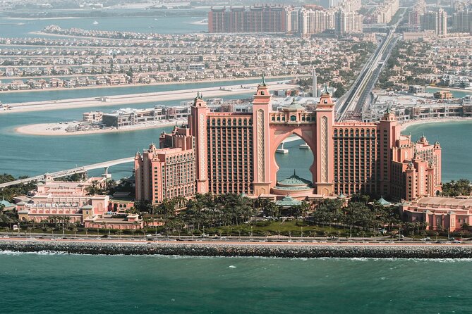 Dubai City Tour with Desert Safari, Camel Ride, Dune Bashing & BBQ - Tanoura, fire show, and belly dancing under the stars