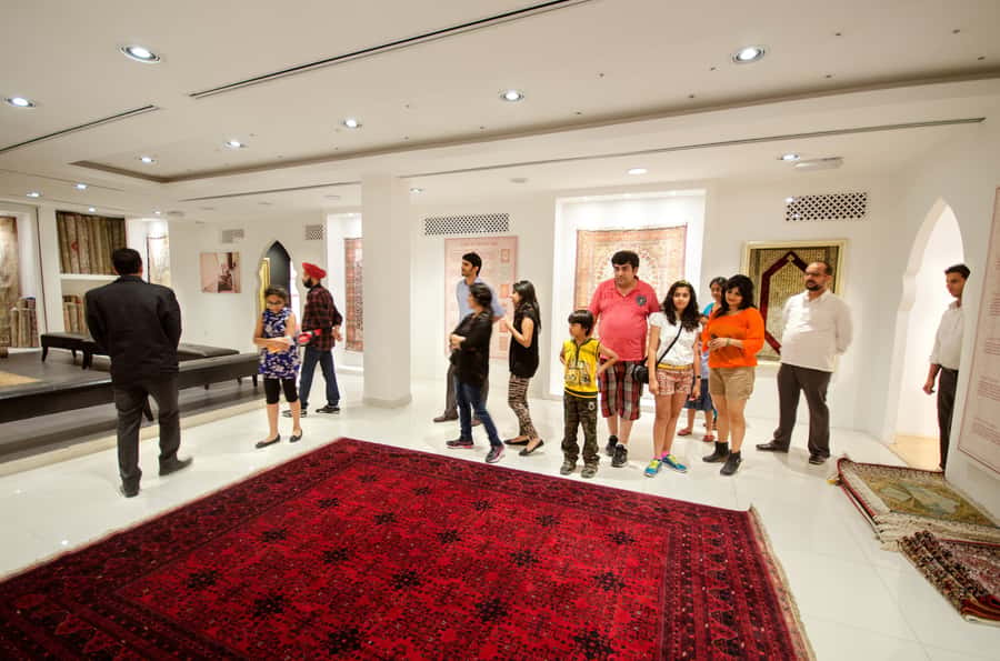 Dubai Cityscape and Desert Safari Full-Day Tour - Desert safari drive and the Bedouin camp program: camel, sandboard, henna, fire dance
