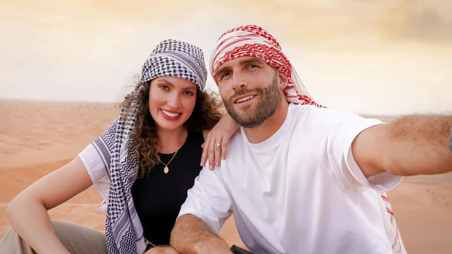 Dubai Desert Adventure: Red Dunes Guided Quad/Polaris & BBQ - Sandboarding, the highest-dune photo stop, and that sunset moment