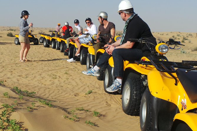 Dubai Desert Afternoon Quad Safari with Camel Ride, BBQ Dinner and Belly Dancing - Sand Trax Tours quad station: gear up and learn the rules fast