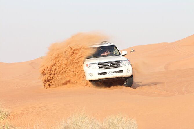 Dubai Desert Bespoke: Red Dunes Safari, Camel Ride & BBQ Options - Sandboarding and the Sunset Views: The Fun Part You Control
