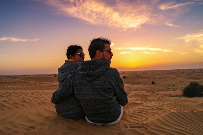 Dubai Desert Discovery: Red Dunes Safari, Sandboard & Camel Ride - Sandboarding at the end of the ride, easy fun without the lesson