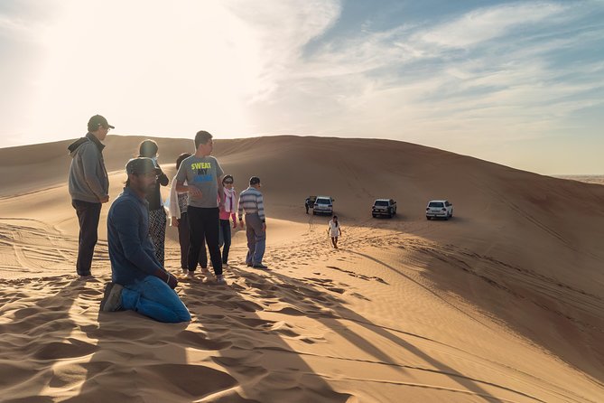 Dubai Desert Discovery: Red Dunes Safari, Sandboard & Camel Ride - Afternoon sunset options: timing your photos without slowing the day