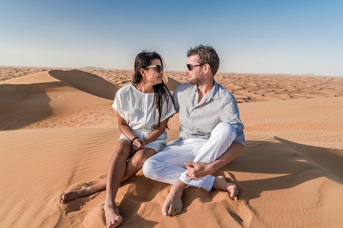 Dubai Desert Discovery: Red Dunes Safari, Sandboard & Camel Ride - Door-to-door pickup from Dubai, Sharjah, and Ajman