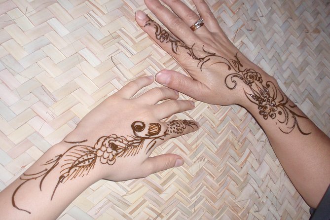 Dubai Desert Excursions with BBQ Dinner & Live Entertainment - Sandboarding and the camel ride: short, fun, and doable