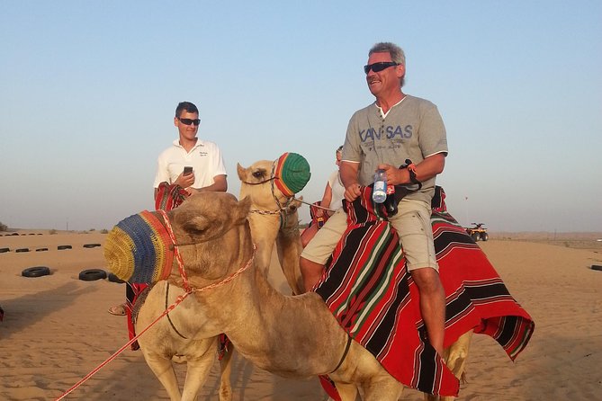 Dubai Desert Morning Tour in 4WD Vehicle: Camel Ride, Quad Bike Tour, Sandboarding, and Camel Farm - Quad Bike Time: What You Do, What You Need, What to Expect