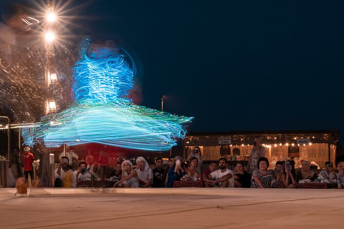 Dubai Desert Safari: 4x4 Dune Bashing, Camel Ride & BBQ Dinner - Tanaura Dance, Fire Show, and Belly Dance: The Entertainment Block