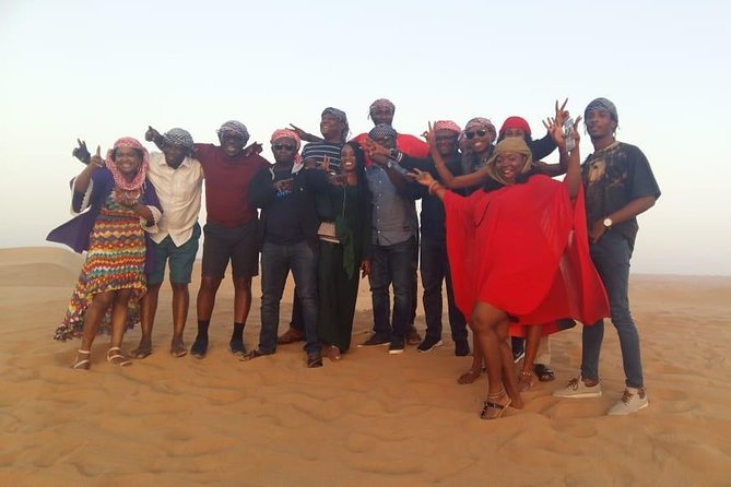 Dubai Desert Safari Adventure, 60mins ATV, Camel Ride, Shows, BBQ - Camel ride, henna for ladies, and Arabic costume photos