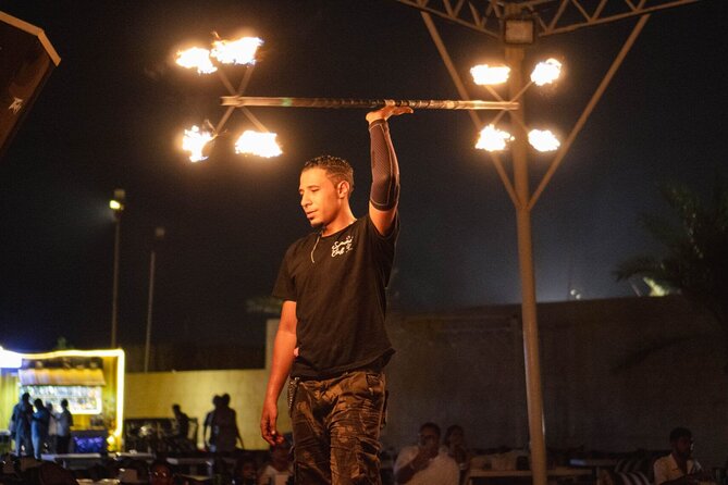 Dubai Desert Safari Adventure, Camel Ride, Sand surf, BBQ Dinner - Entertainment at Night: Belly Dancing, Tanoura, and Fire