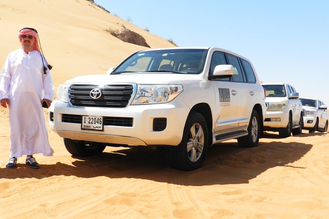 Dubai Desert Safari, ATV open desert, Camel ride, Shows & BBQ - The Morning of Adrenaline: 4x4 Dune Bashing and Sandboarding