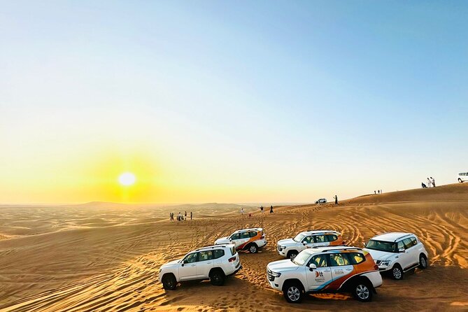 Dubai Desert Safari:BBQ Dinner, Dune Bashing & Live Entertainment - Sand Boarding and Sunset Photography: Timing the Golden Hour