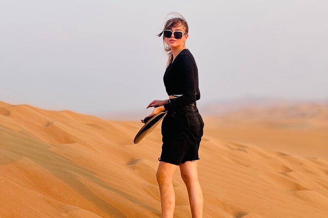Dubai Desert Safari, BBQ, Live Shows, Camel, Sandboard (7-Hours) - Inside the Bedouin camp: henna, camel ride, falcon, and shisha