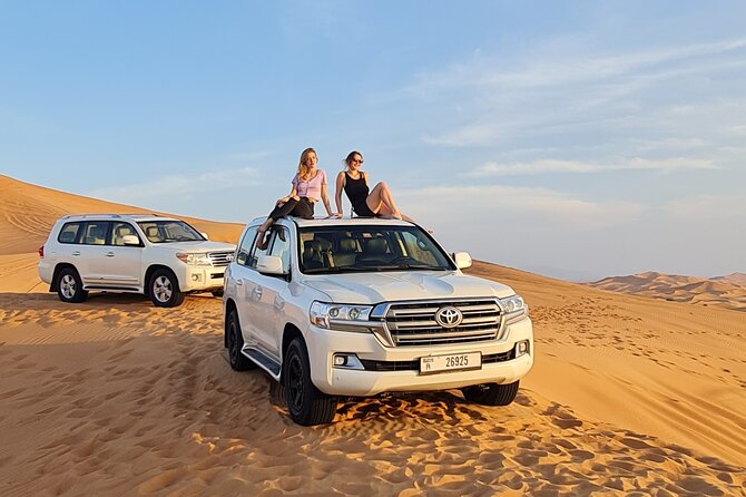 Dubai Desert Safari & Buffet Dinner and Camel ride with PRIVATE CAR - Sandboarding and a sunset photo stop, timed for the best light