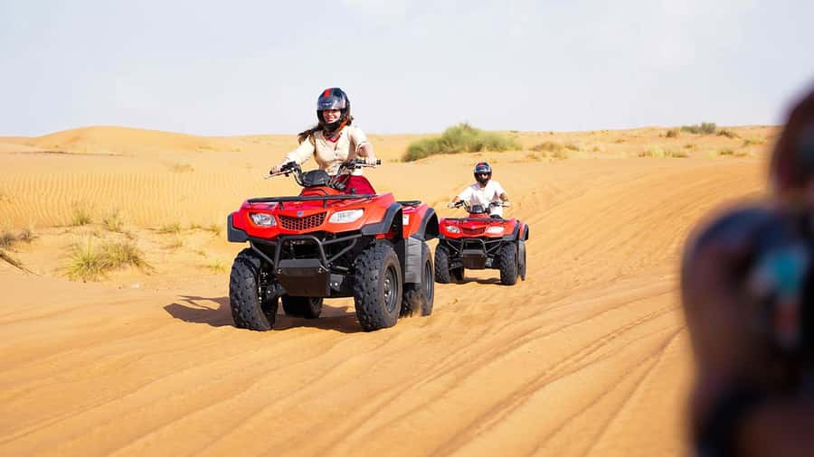 Dubai: Desert Safari, Camel Ride, Sandboarding, Quad Bike - Desert Pickup to Red Dunes: How the Day Starts