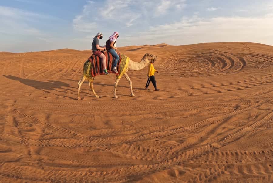 Dubai: Desert Safari, Camel Ride, Sandboarding, Quad Bike - What to Bring and Wear for a Sand-Filled Day
