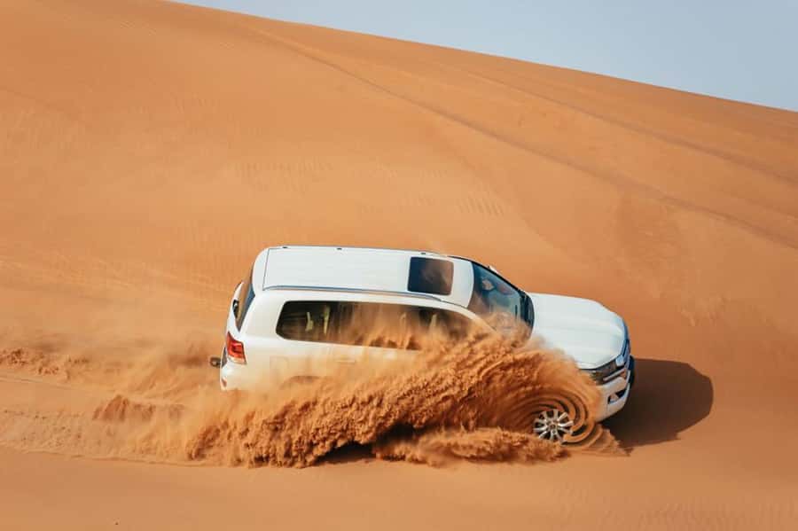 Dubai: Desert Safari, Camel Ride, Sandboarding, Quad Bike - Camel Ride in the Desert: Short, Classic, and Surprisingly Emotional