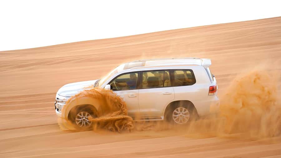 Dubai: Desert Safari, Camel Ride, Sandboarding, Quad Bike - Value for Around $30: What You Really Buy