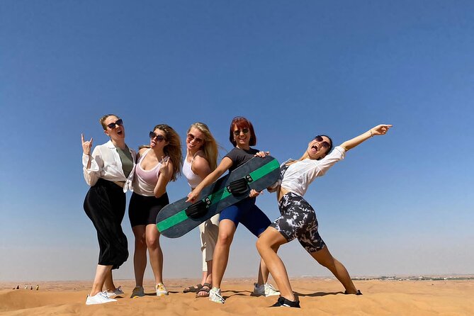 Dubai Desert Safari: Dune Bashing, Camel Ride & BBQ Dinner - Quad biking and sandboarding on red dunes