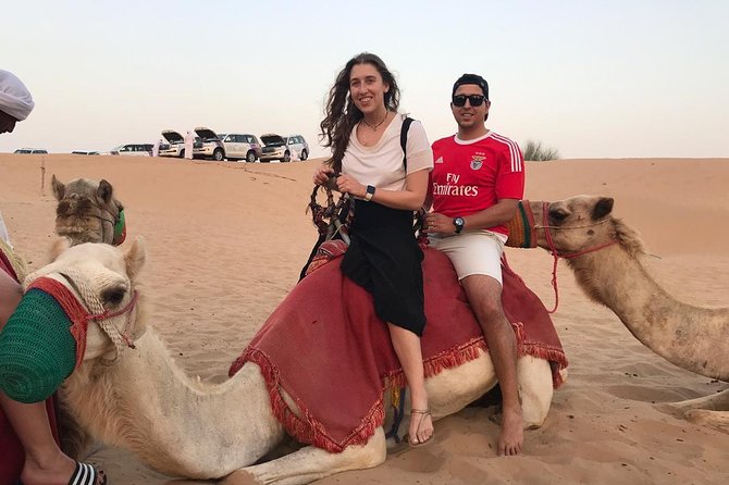 Dubai Desert Safari, Evening at Red-Dunes, 5<em> BBQ Dinner – Quick hits before you go’ /></p>
<ul>
<li><strong>Air-conditioned 4×4 dune bashing</strong> plus snack and restroom support on the ride</li>
<li><strong>Sandboarding and camel ride</strong> as short, do-it-now activities, not optional add-ons</li>
<li><strong>Henna design and Arabic sweets</strong> at the camp, with coffee or tea included</li>
<li><strong>Evening entertainment at camp</strong> including Tanoura and fire dance, with belly dance excluded during Ramadan</li>
<li><strong>Buggy and ATV options for a 30-minute desert drive</strong> shown as admission-free in the experience details</li>
<li><strong>BBQ international buffet</strong> with veg and non-veg choices, plus sunset photography</li>
</ul>
<div class="twil" style="margin: 20px 0; padding: 15px 0;"><p>Where else the fire pit and the show are the point</p><ul style="margin: 10px 0; padding-left: 0; list-style: none;"><li style="margin: 0 0 12px 0; padding: 0 0 12px 0; border-bottom: 1px solid #eee; line-height: 1.4;"><a href="https://uaetourreviews.com/dubai-red-dune-safari-quad-bike-camel-ride-bbq-dinner/">Dubai: Red Dune Safari, Quad Bike, Camel Ride, BBQ Dinner</a><br><span style="font-size: 0.82em; color: #555;"><span style="color: #c2703a;">★</span> 4.9 &nbsp;&middot;&nbsp; 32,185 reviews</span></li><li style="margin: 0 0 12px 0; padding: 0 0 12px 0; border-bottom: 1px solid #eee; line-height: 1.4;"><a href="https://uaetourreviews.com/dubai-desert-safari-with-bbq-dinner-quad-biking-options/">Dubai: Desert Safari with BBQ Dinner & Quad Biking Options</a><br><span style="font-size: 0.82em; color: #555;"><span style="color: #c2703a;">★</span> 4.9 &nbsp;&middot;&nbsp; 20,485 reviews</span></li><li style="margin: 0 0 12px 0; padding: 0 0 12px 0; border-bottom: 1px solid #eee; line-height: 1.4;"><a href="https://uaetourreviews.com/dubai-quad-bike-safari-camels-al-khayma-camp-bbq-dinner/">Dubai: Quad Bike Safari, Camels & Al Khayma Camp BBQ Dinner</a><br><span style="font-size: 0.82em; color: #555;"><span style="color: #c2703a;">★</span> 4.9 &nbsp;&middot;&nbsp; 10,283 reviews</span></li><li style="margin: 0; padding: 0; border-bottom: none; line-height: 1.4;"><a href="https://uaetourreviews.com/desert-safari-with-bbq-dinner-quad-bike-camel-ride-from-dubai/">Desert Safari With BBQ Dinner, Quad Bike & Camel Ride from Dubai</a><br><span style="font-size: 0.82em; color: #555;"><span style="color: #c2703a;">★</span> 5.0 &nbsp;&middot;&nbsp; 5,211 reviews</span></li></ul></div><h2 id="entering-the-red-dunes-what-the-6-to-7-hours-really-feels-like">Entering the Red Dunes: what the 6 to 7 hours really feels like</h2>
<p><img width="668" height="446" decoding="async" src=