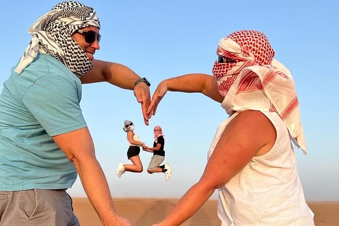 Dubai Desert Safari- Experience The Thrill in The Desert - Dinner, shisha, and the big camp performances by firelight