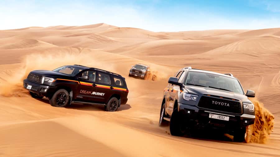 Dubai Desert Safari - Premium BBQ Dinner, Camel Ride & Shows - Bedouin-style BBQ dinner: buffet vs private table service