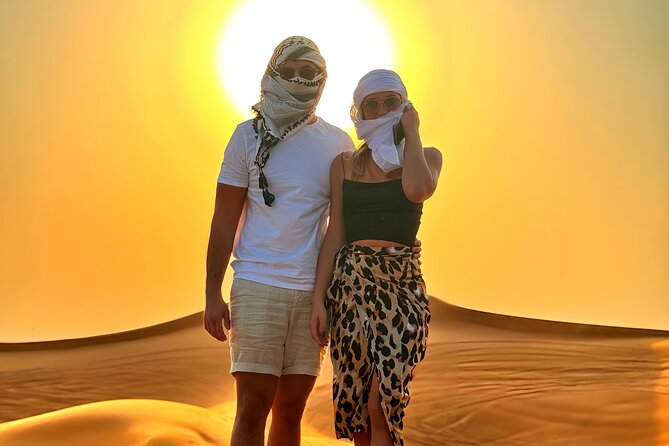 Dubai Desert Safari Premium Tour - Stop 1 in Lahbab: 4WD dune bashing and sandboarding basics