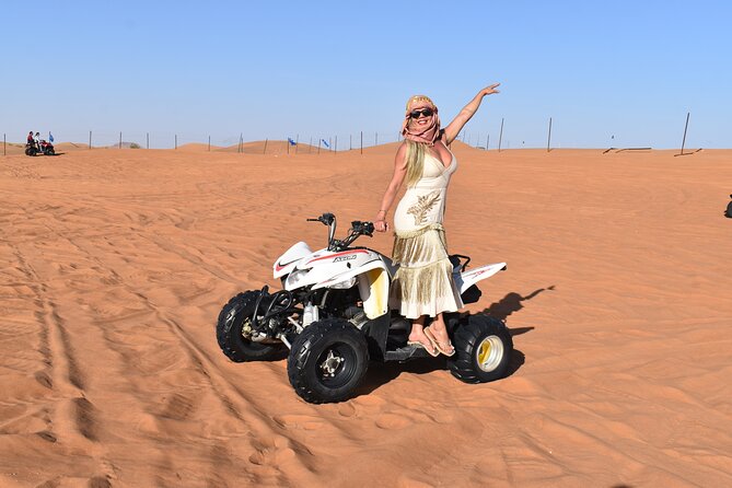 Dubai: Desert Safari, Quad bike and Sand boarding with BBQ Dinner - 20-minute dune bashing: the roller-coaster start, done with professionals
