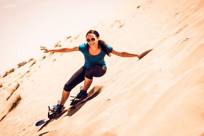 Dubai Desert Safari: Quad Bike, Camel Ride and BBQ Dinner - BBQ Dinner With Belly Dance, Tanoura, and the Fire Show