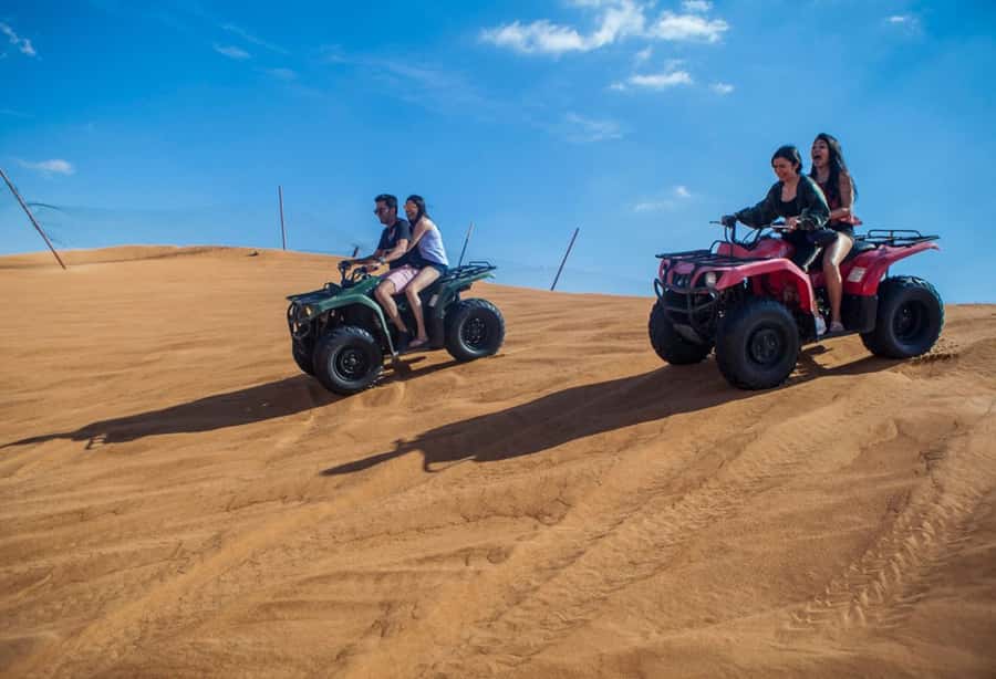 Dubai: Desert Safari, Quad Bike, Camel Ride and Sandboarding - Camel Ride and Sandboarding: Two Activities With Different Personalities