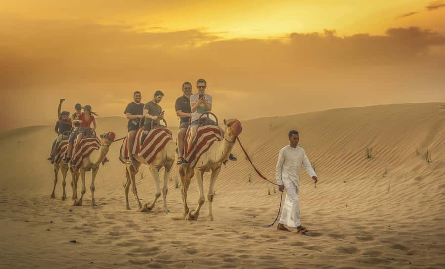 Dubai: Desert Safari, Quad Bike, Sandboarding, Camels & BBQ - Sandboarding and Quad Bikes: Choose Your Level of Crazy