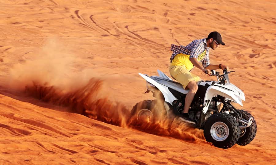 Dubai: Desert Safari, Quad Bike, Sandboarding, Camels & BBQ - Price and Value at About $44 Per Person