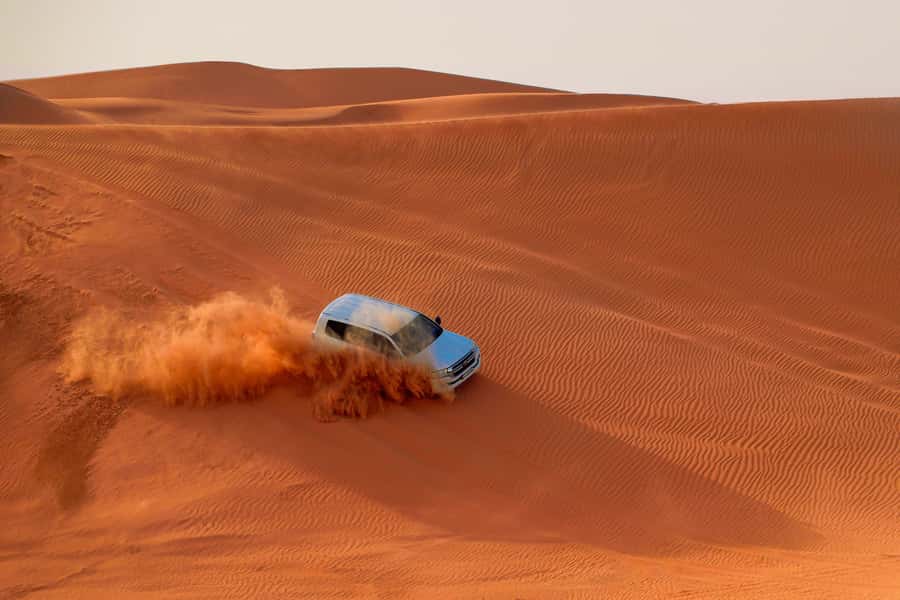 Dubai: Desert Safari, Quad Bike, Sandboarding, Camels & BBQ - Dune Bashing That Actually Feels Controlled