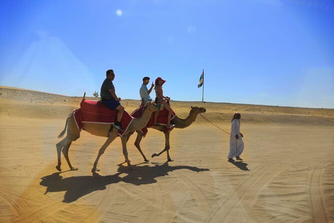 Dubai Desert Safari Sand board Camel Ride & Quad Bike - Entering the Red Dunes: dune bashing plus the dune-top photo moment