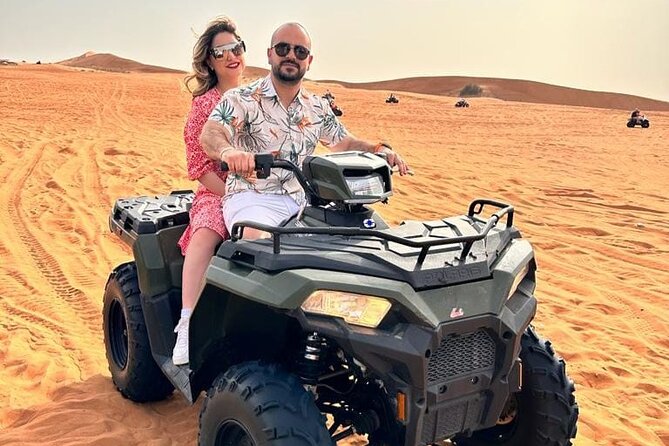 Dubai Desert Safari Sharing with Quad, Shows, Camel and Dinner - Pickup and the Road Out of City Life (Start Time at 2:30 pm)
