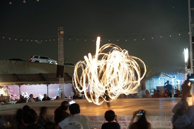 Dubai Desert safari Tour with Live BBQ & Belly Dance Shows - Al Aweer camp time: camel rides, photo points, and the big show atmosphere