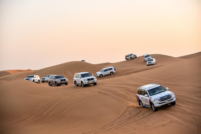 Dubai Desert Safari with BBQ And 4W Land Cruiser Dune Bashing Experience - 4x4 Dune Bashing: The Main Event and How to Set Expectations
