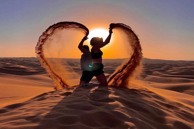 Dubai Desert Safari with BBQ and 4WD Land Cruiser Dune Bashing - Live Shows: Belly Dance, Tanoura, and Fire