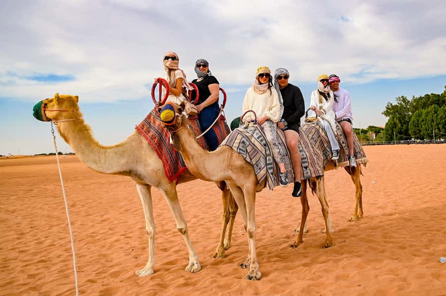 Dubai: Desert Safari with BBQ Dinner & Quad Biking Options - The 7-hour camp finish: BBQ dinner plus Tanoura and fire