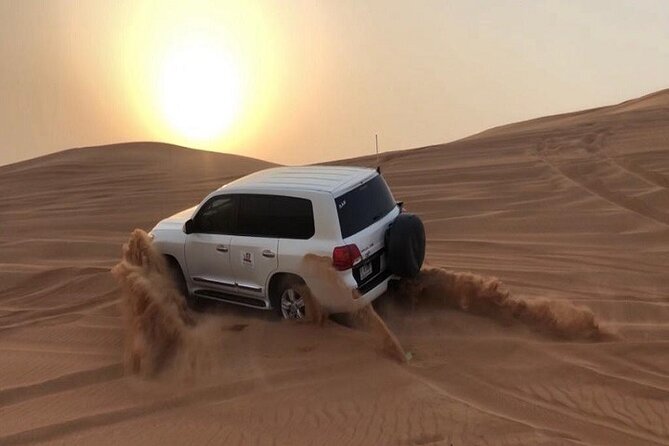 Dubai Desert Safari With Camel Ride and Sand Boarding - Pickup to dunes: what the transport sets up for you